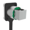 Close-up of a silver and gray rectangular plug partially inserted into a matching socket with a black frame and green accent.