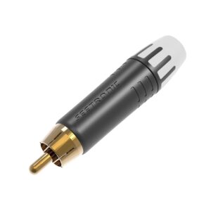 Close-up of a single RCA plug with a black body, gold plating, white/gray details, and "Seetronic" engraved on the side.